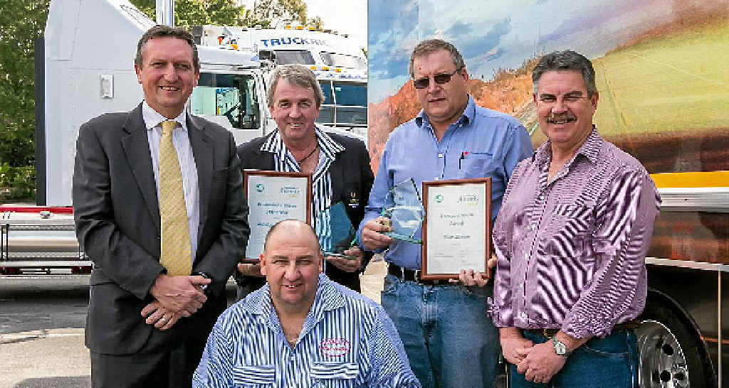 STARS: Geoff Crouch, of NatRoad, Phillip Southwell, Troy Cook (front), Ken Stehbens (who collected the award for Brett Simcoe) and National Transport Insurance national manager Owen Driscoll. STARS: Geoff Crouch, of NatRoad, Phillip Southwell, Troy Cook (front), Ken Stehbens (who collected the award for Brett Simcoe) and National Transport Insurance national manager Owen Driscoll.